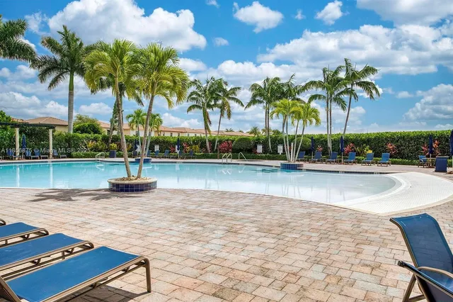 a view of a swimming pool and lake