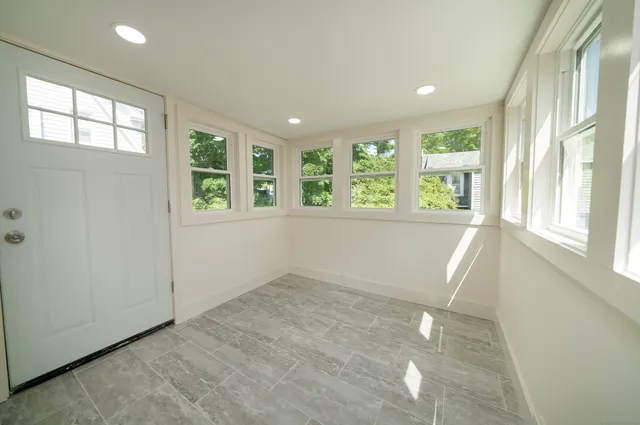 an empty room with windows