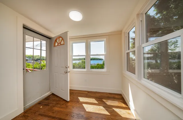 a view of an empty room and window