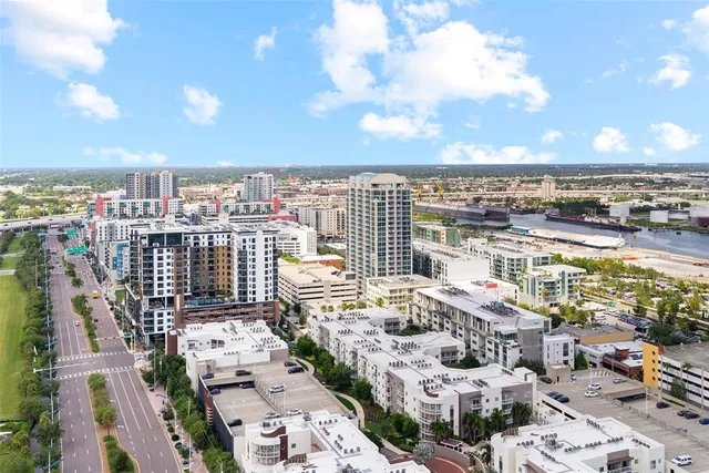 a kitchen with stainless steel appliances a stove a refrigerator and a sink