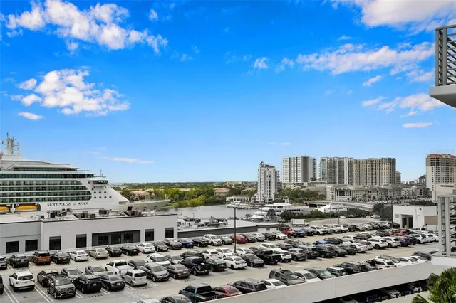 a kitchen with stainless steel appliances granite countertop a stove oven and a refrigerator