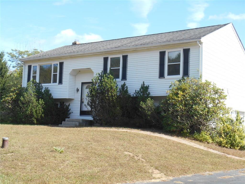 55 Fox Ridge Lane Tolland, CT 06084 - Photo 1 of 1 a view of a house with a yard and potted plants