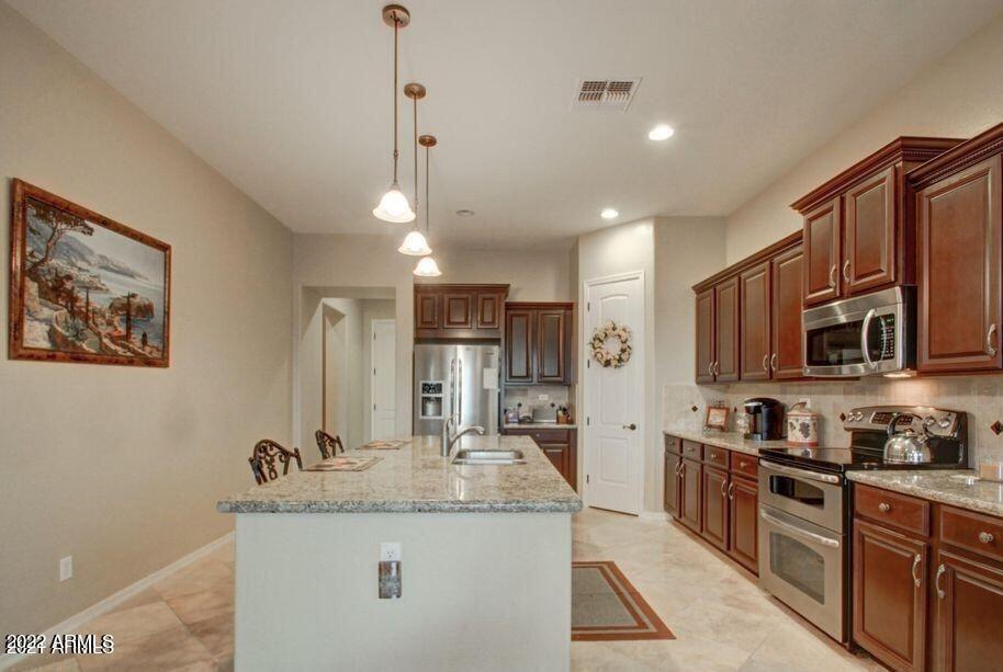 14238 West Coronado Road Goodyear, AZ 85395 - Photo 7 of 38 20210625142422892682000000-o