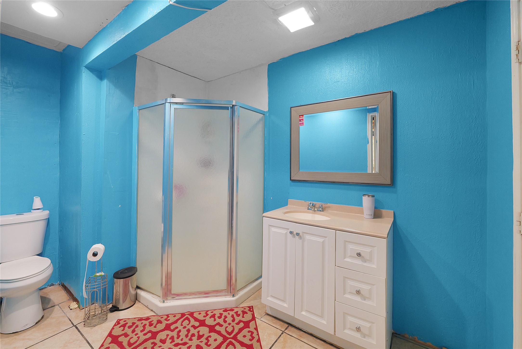 7525 Canal Street Houston, TX 77012 - Photo 14 of 18 a bathroom with a sink a toilet and mirror
