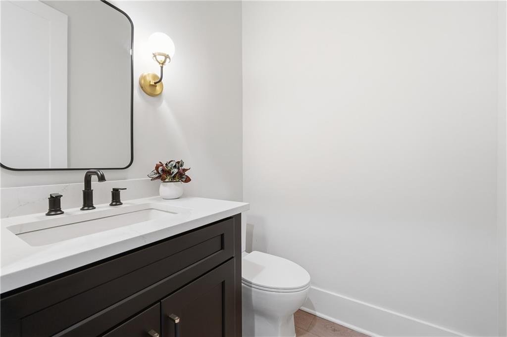 157 Palisade Drive Rydal, GA 30171 - Photo 54 of 68 a bathroom with a sink and a mirror