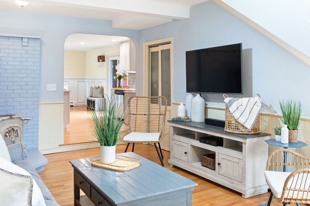 17 Weaver Street Wareham, MA 02576 - Photo 21 of 37 a living room with furniture and a flat screen tv