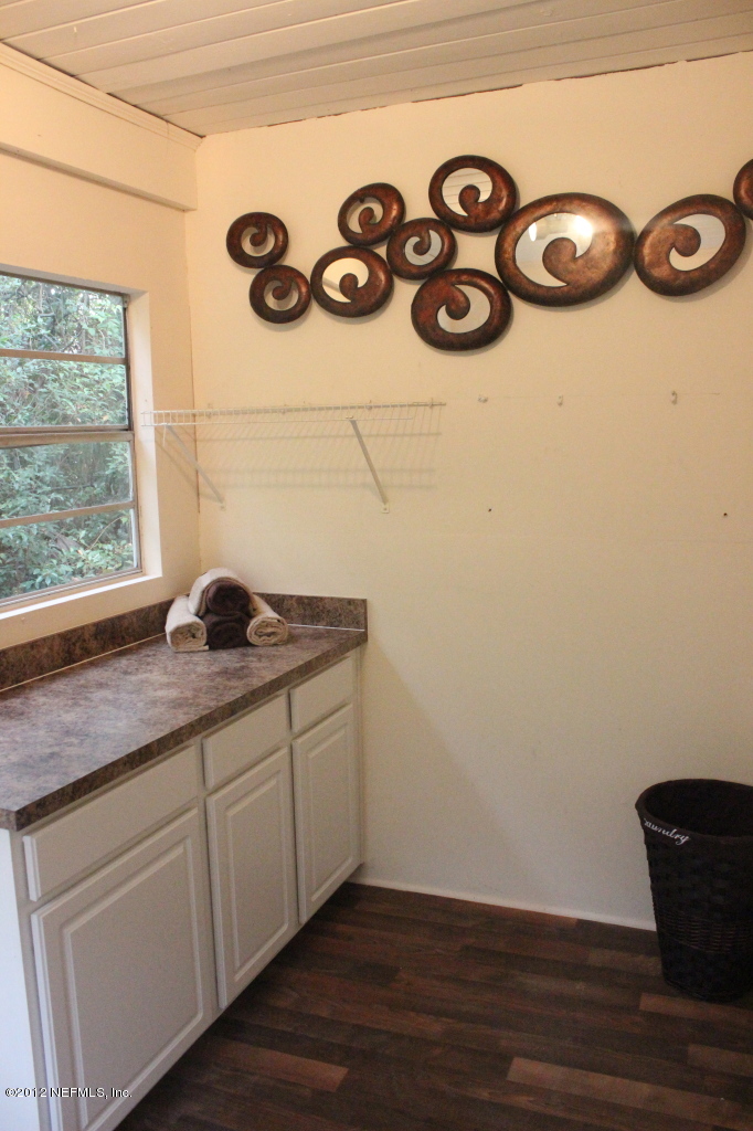 4525 Sunderland Road Jacksonville, FL 32210 - Photo 28 of 35 a room with storage and utility