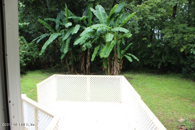 4525 Sunderland Road Jacksonville, FL 32210 - Photo 10 of 35 a view of backyard with green space