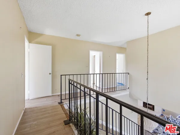 a view of hallway with stairs