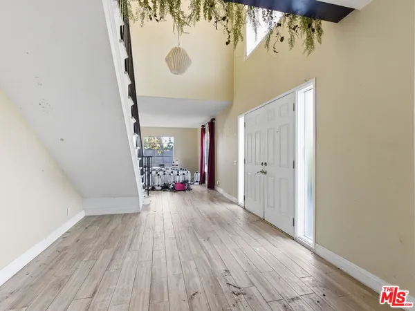 a view of a livingroom with wooden floor