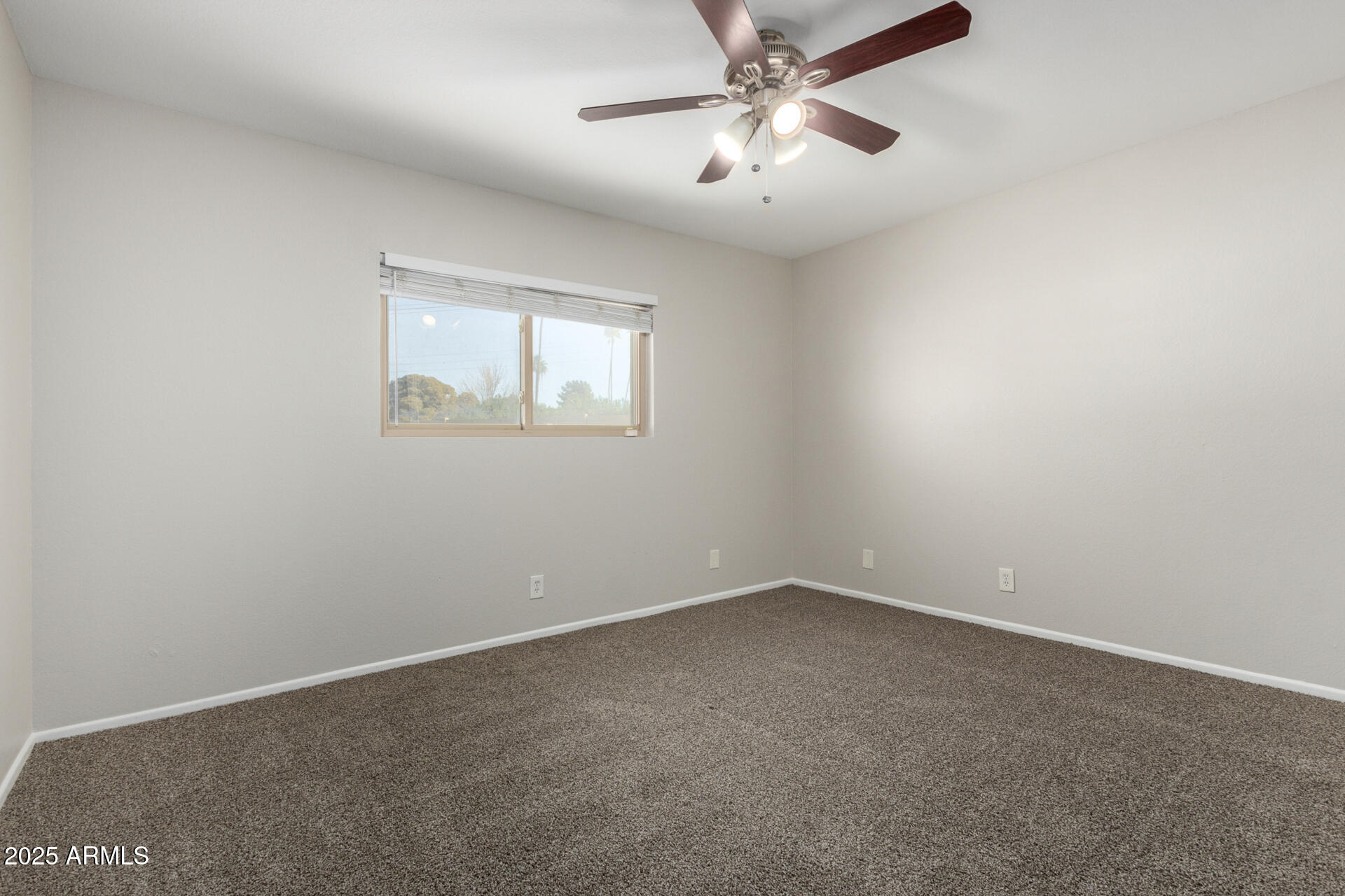 2201 South Evergreen Road Tempe, AZ 85282 - Photo 16 of 42 an empty room with a window