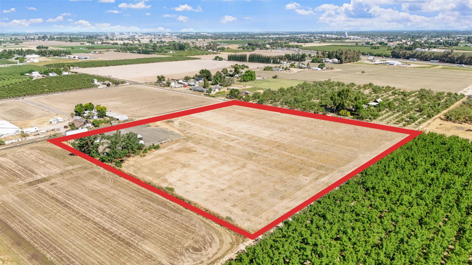 18365 East Clausen Road Turlock, CA 95380 - Photo 6 of 28 an aerial view of a house and lake view