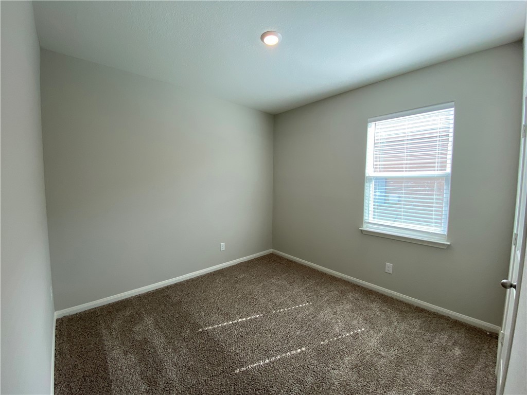 113 Declaration Lane Liberty Hill, TX 78642 - Photo 17 of 22 an empty room with a window