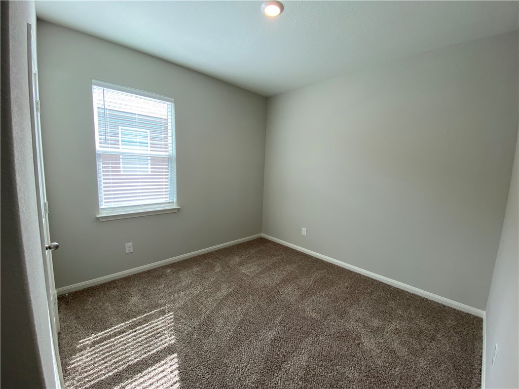 113 Declaration Lane Liberty Hill, TX 78642 - Photo 18 of 22 an empty room with a window