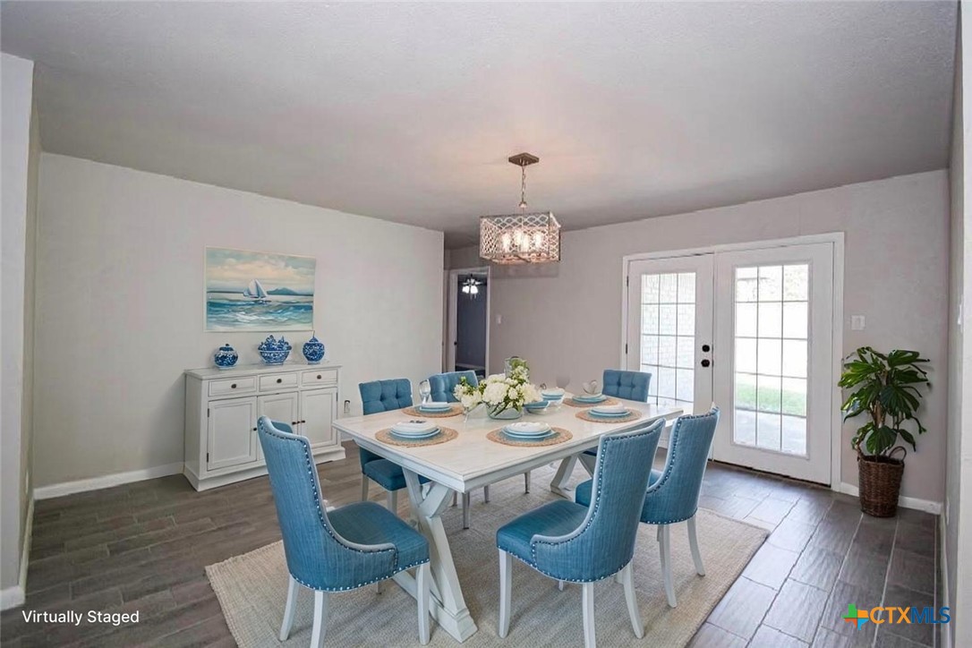 205 Tanglewood Road Temple, TX 76502 - Photo 2 of 26 AI staging of dining room