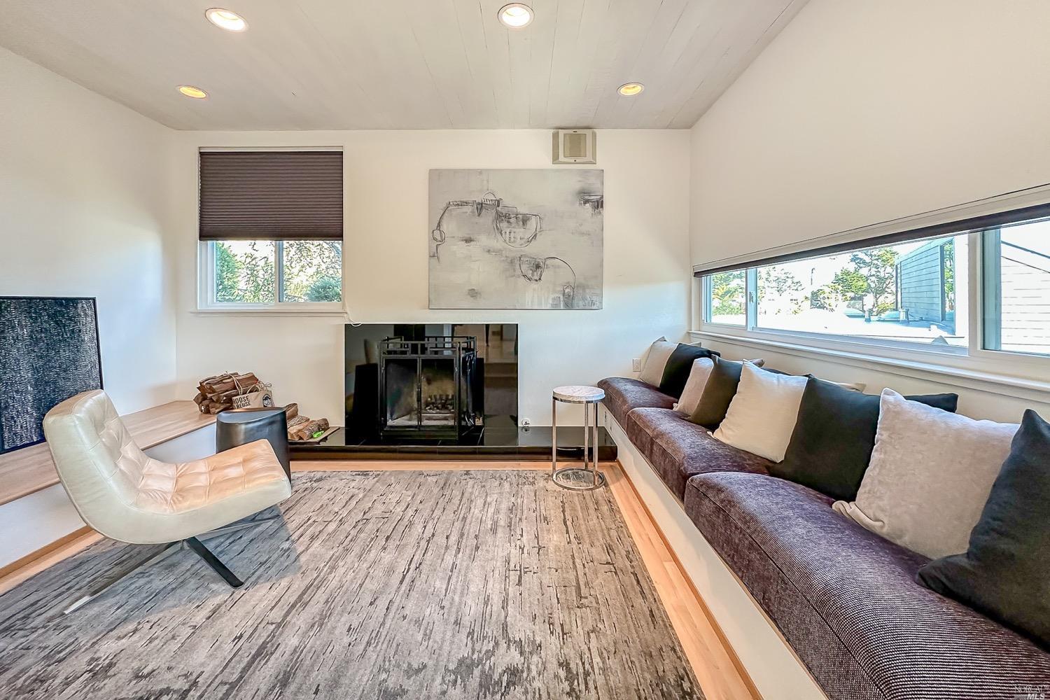 432 Durant Way Mill Valley, CA 94941 - Photo 15 of 69 a living room with furniture and a fireplace