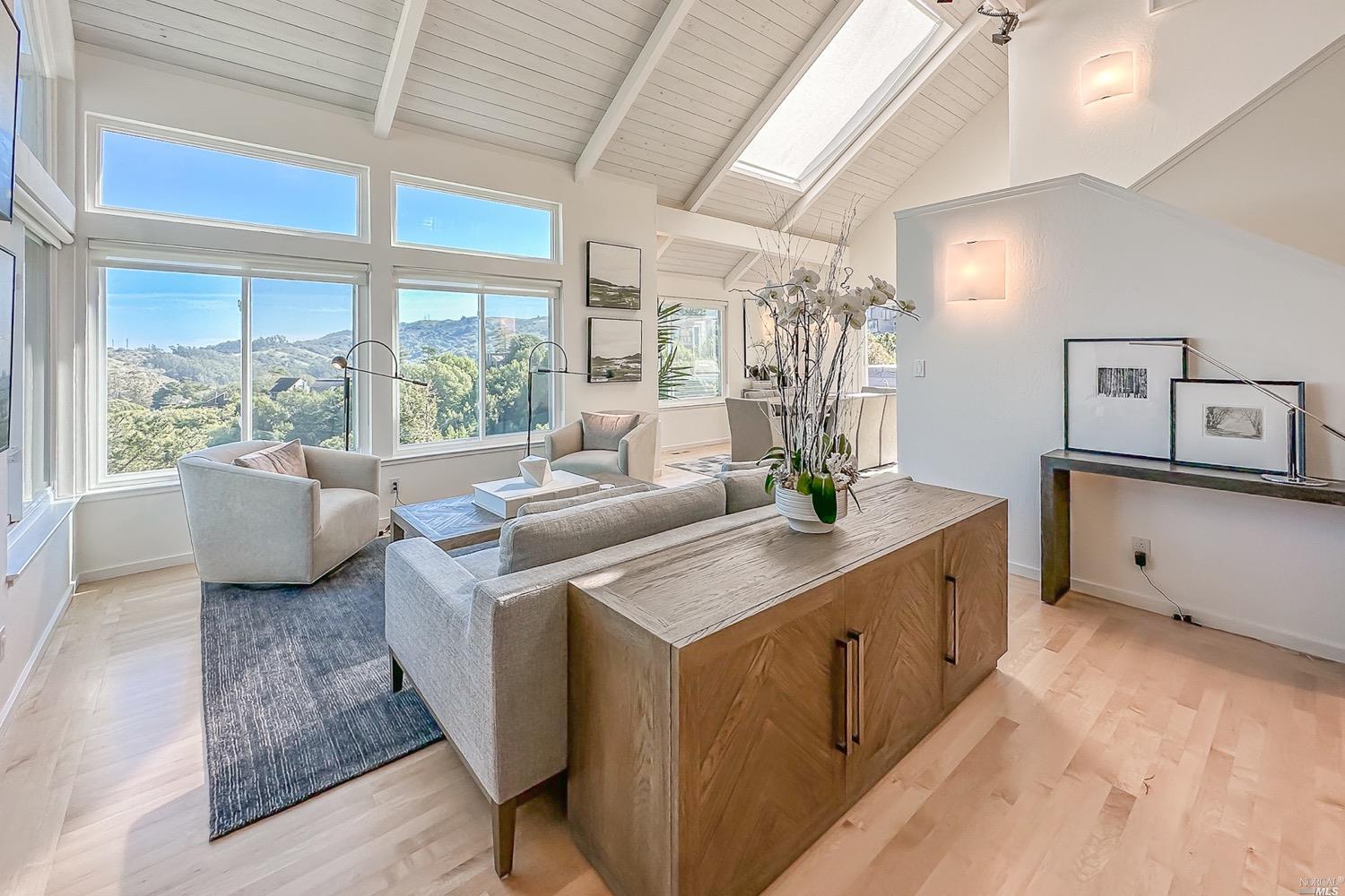 432 Durant Way Mill Valley, CA 94941 - Photo 17 of 69 a view of a kitchen with kitchen island a large window cabinets a sink and stainless steel appliances