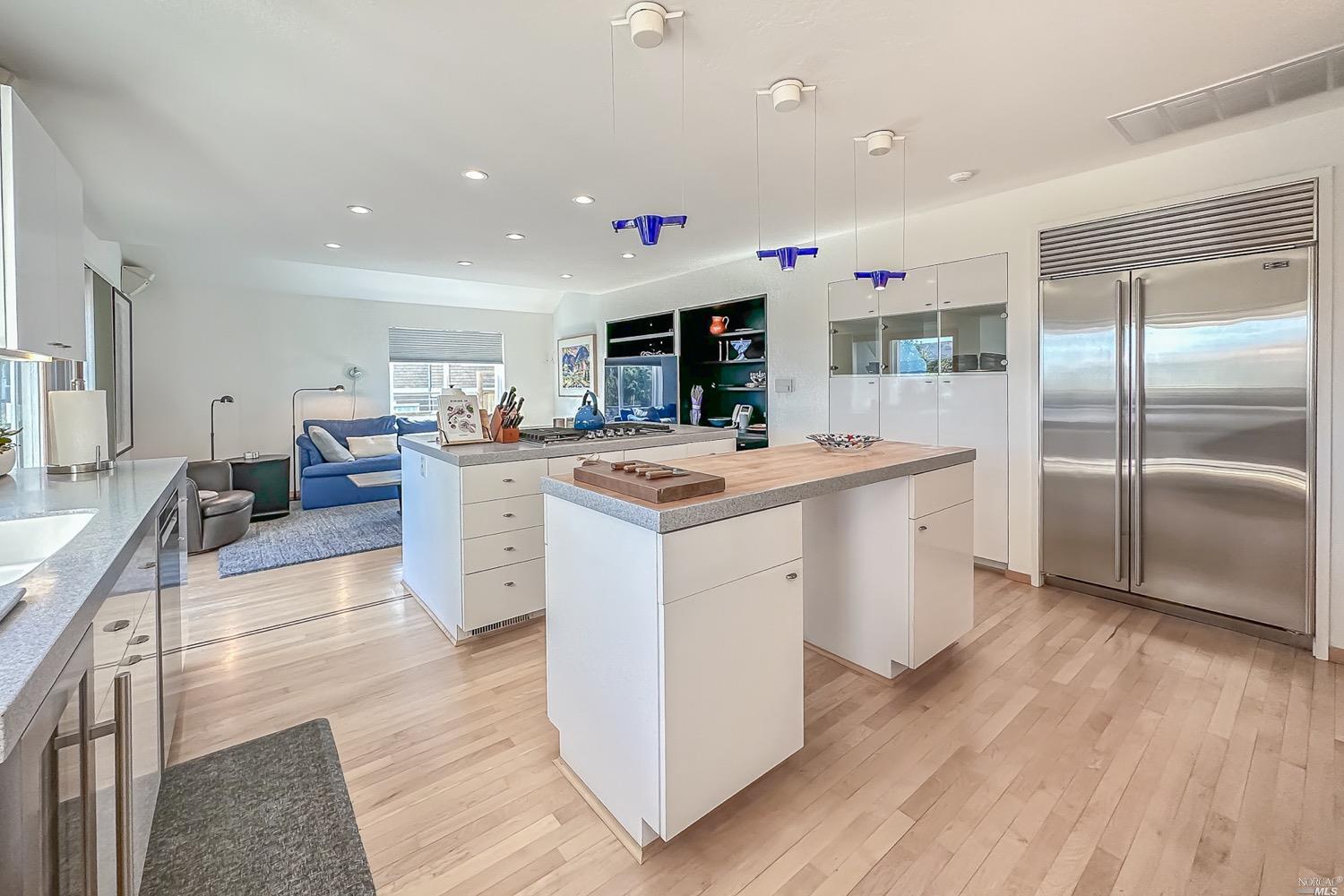 432 Durant Way Mill Valley, CA 94941 - Photo 22 of 69 a kitchen with stainless steel appliances granite countertop a sink stove and refrigerator