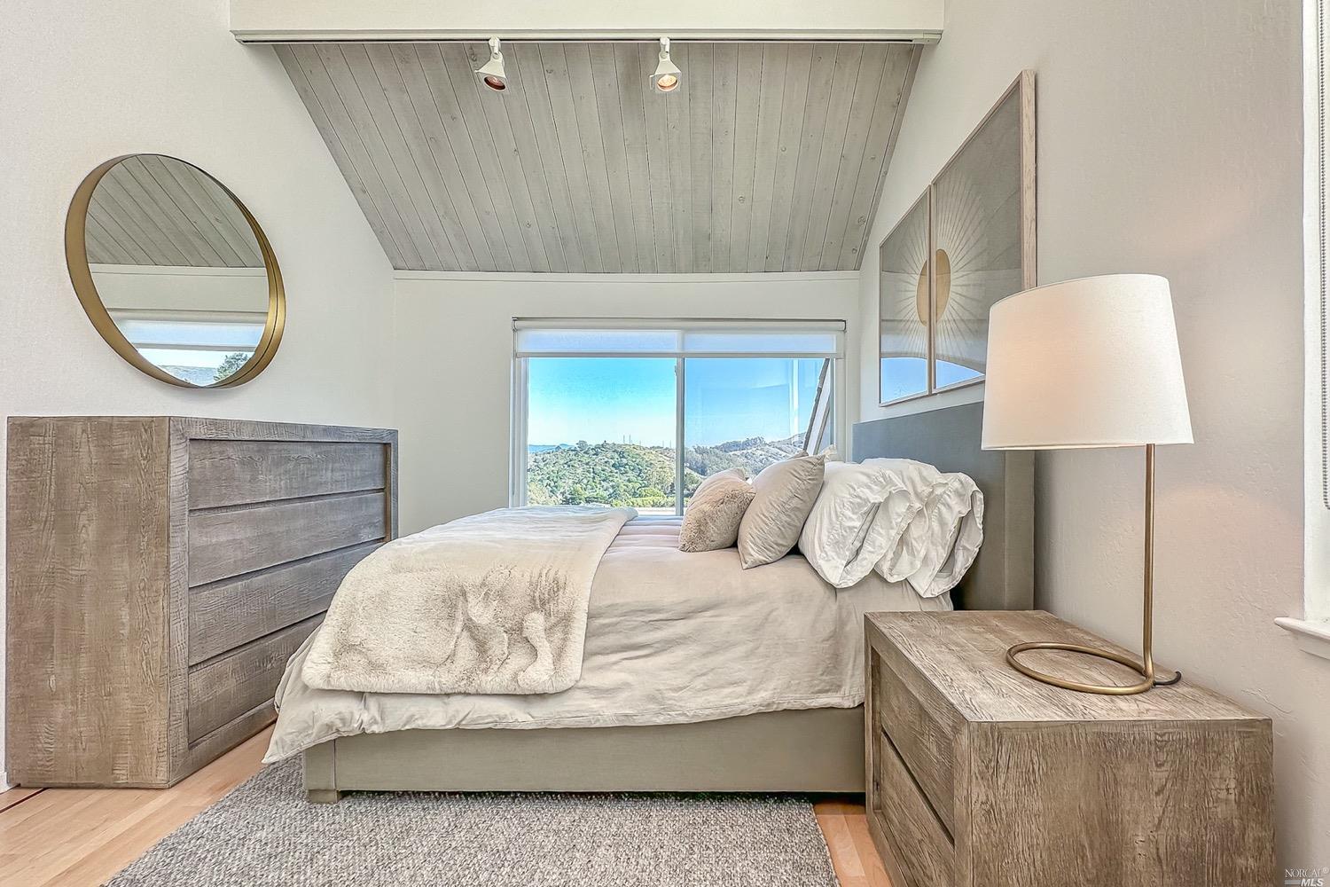 432 Durant Way Mill Valley, CA 94941 - Photo 40 of 69 a bedroom with a bed and a painting on the wall