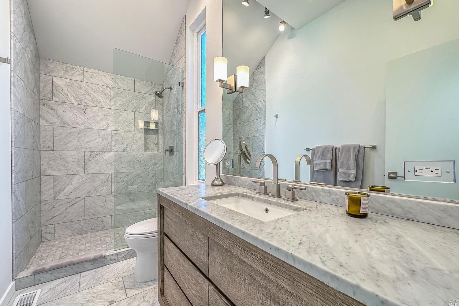 432 Durant Way Mill Valley, CA 94941 - Photo 43 of 69 a bathroom with a double vanity sink and a mirror