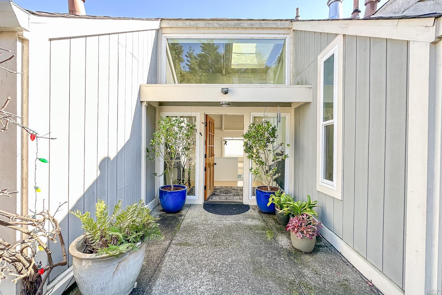 432 Durant Way Mill Valley, CA 94941 - Photo 9 of 69 a view of a entryway with flower pots