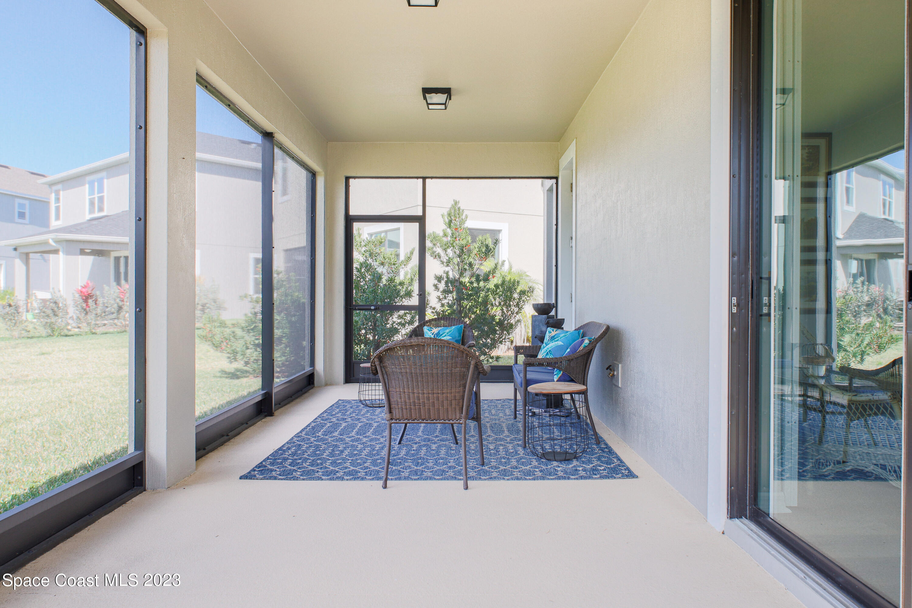 3349 Ribbon Grass Drive Melbourne, FL 32940 - Photo 19 of 45 a view of a living room and a window
