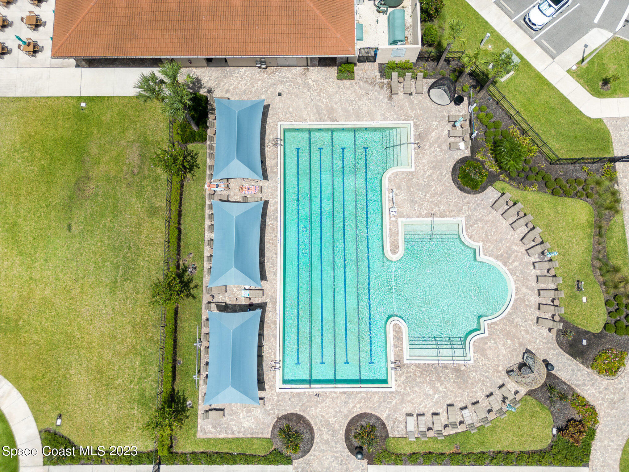 3349 Ribbon Grass Drive Melbourne, FL 32940 - Photo 32 of 45 an aerial view of a house with garden space and windows