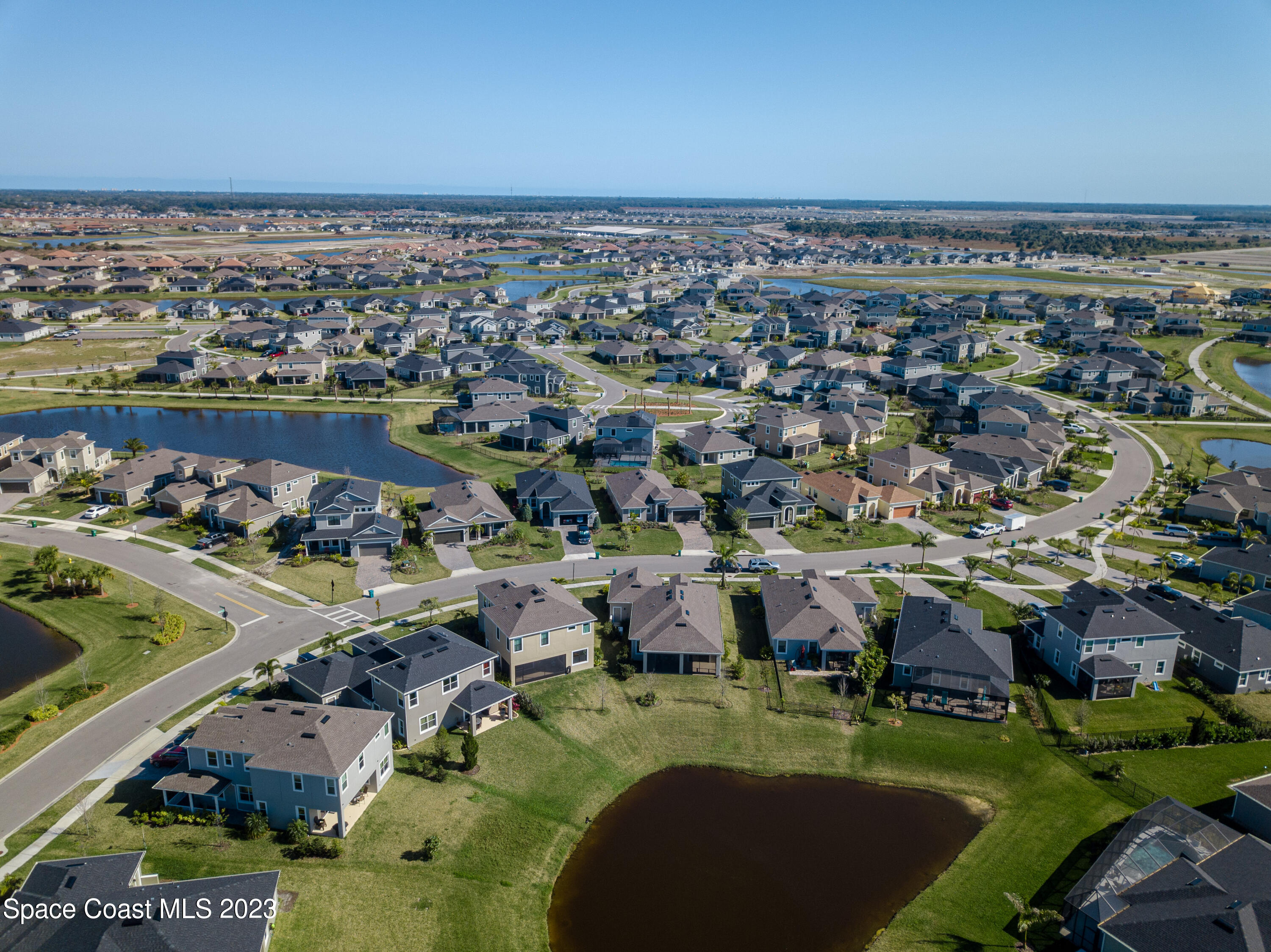 3349 Ribbon Grass Drive Melbourne, FL 32940 - Photo 37 of 45 an aerial view of residential houses with outdoor space