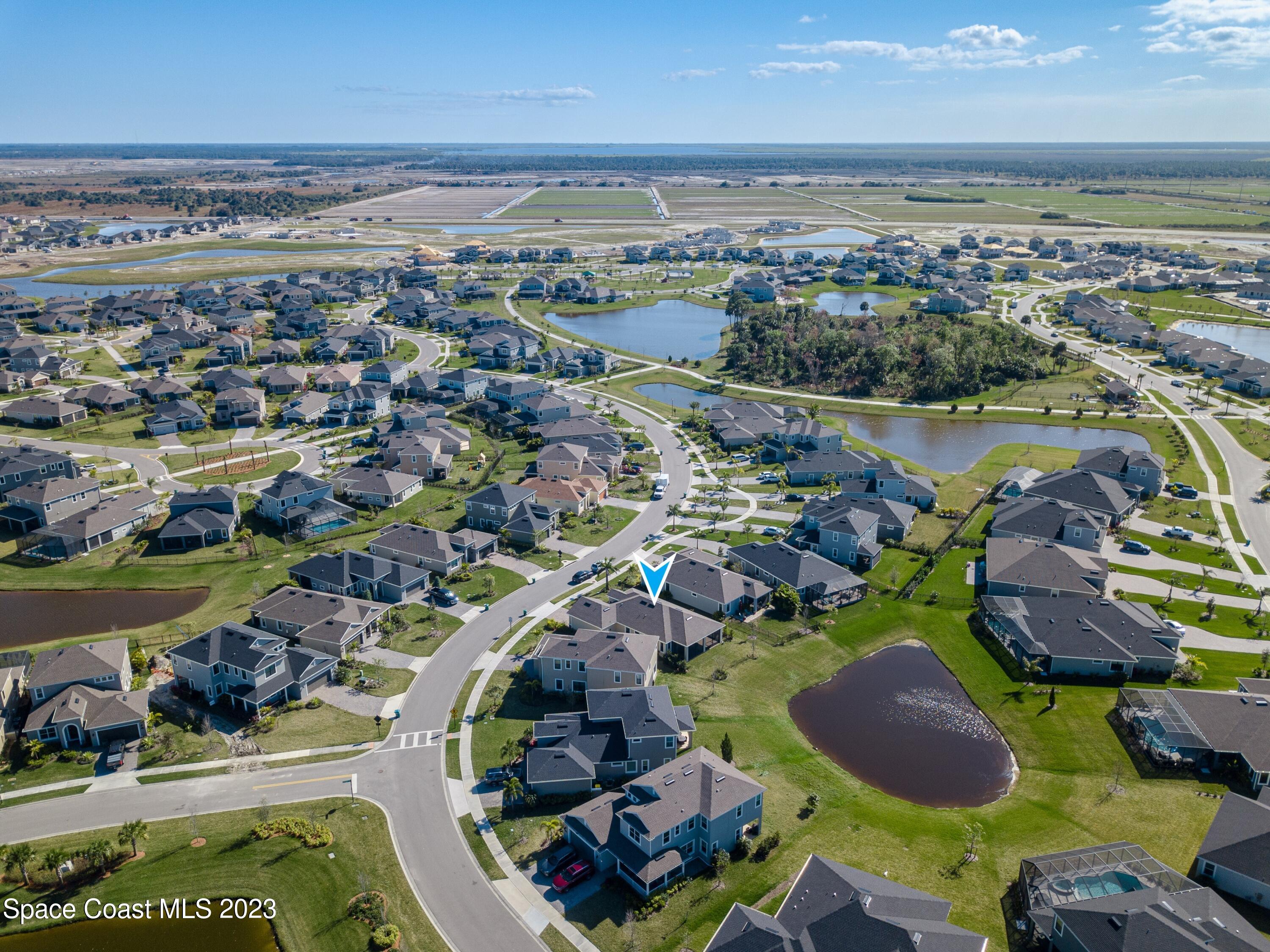 3349 Ribbon Grass Drive Melbourne, FL 32940 - Photo 39 of 45 an aerial view of residential houses with outdoor space