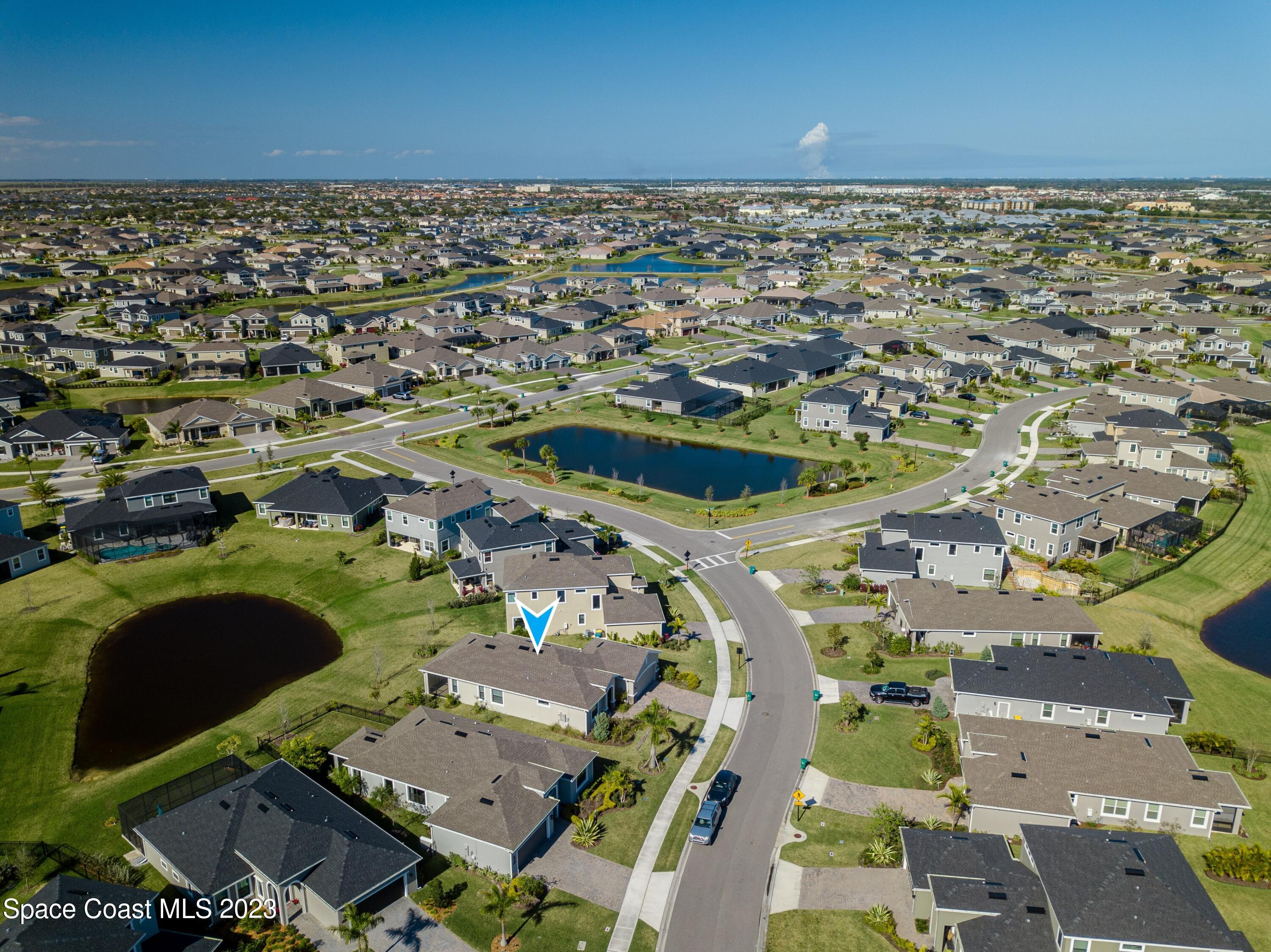 3349 Ribbon Grass Drive Melbourne, FL 32940 - Photo 40 of 45 an aerial view of residential houses with outdoor space