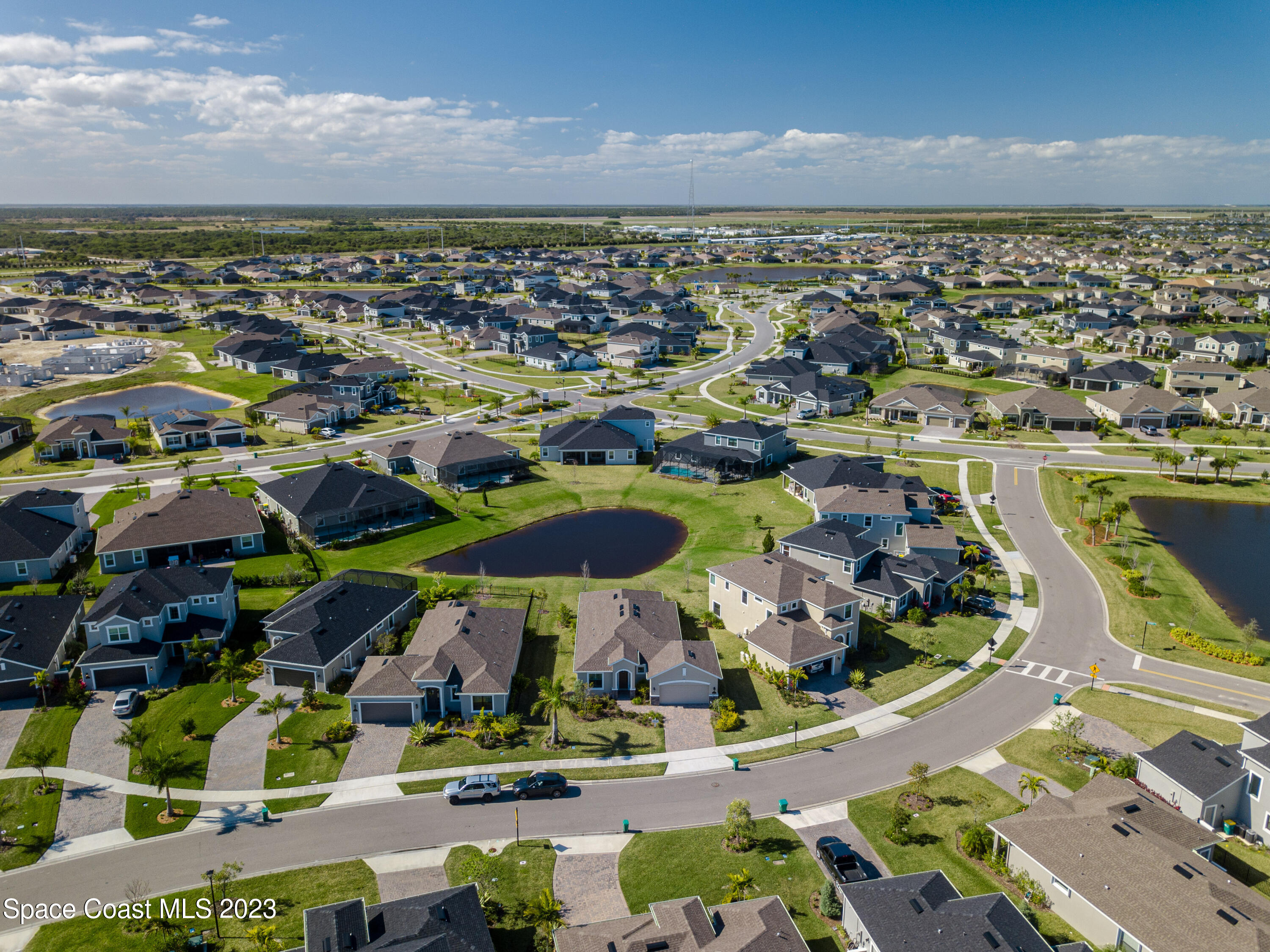 3349 Ribbon Grass Drive Melbourne, FL 32940 - Photo 41 of 45 an aerial view of residential houses with outdoor space