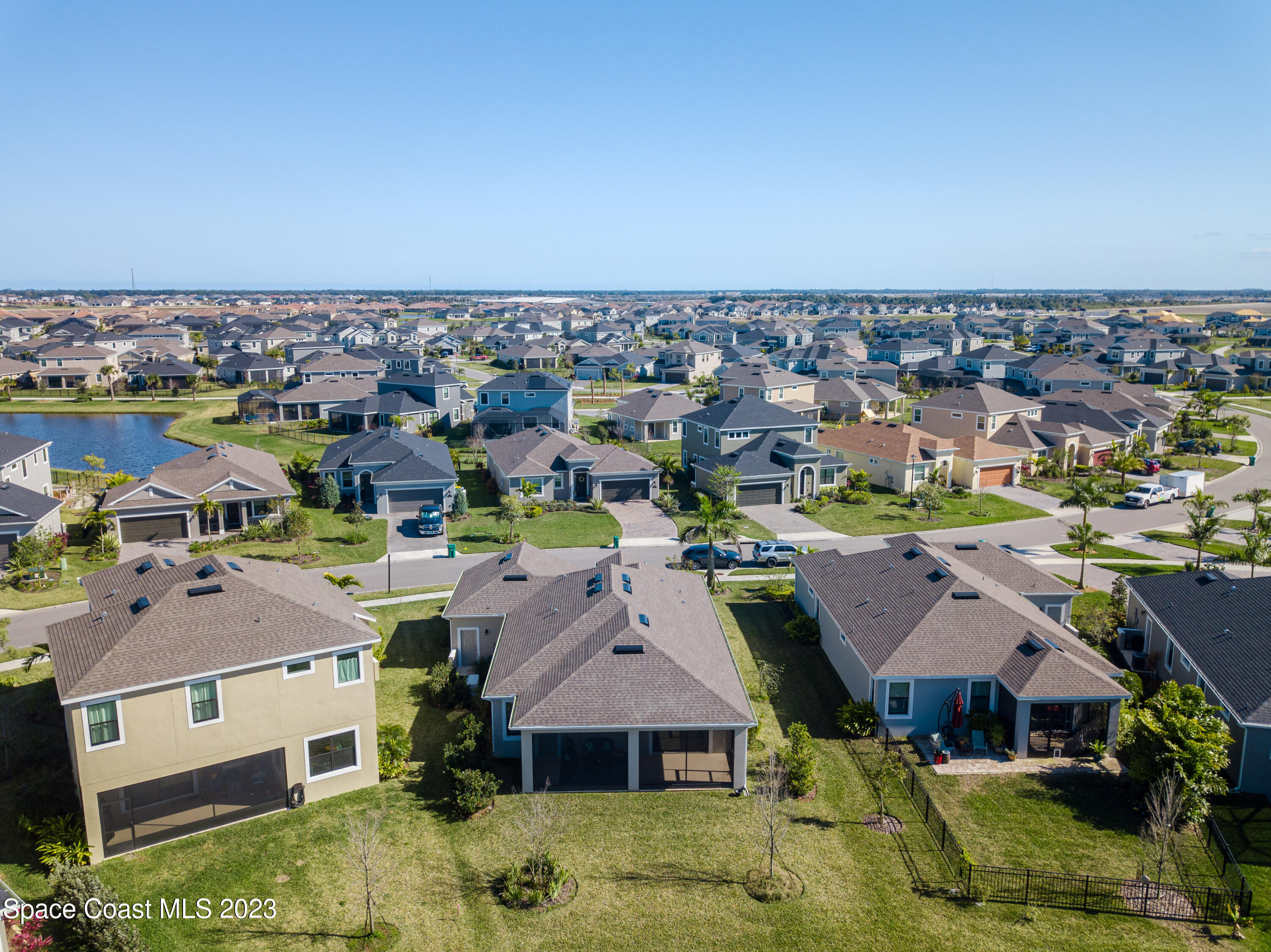 3349 Ribbon Grass Drive Melbourne, FL 32940 - Photo 42 of 45 an aerial view of residential houses with outdoor space
