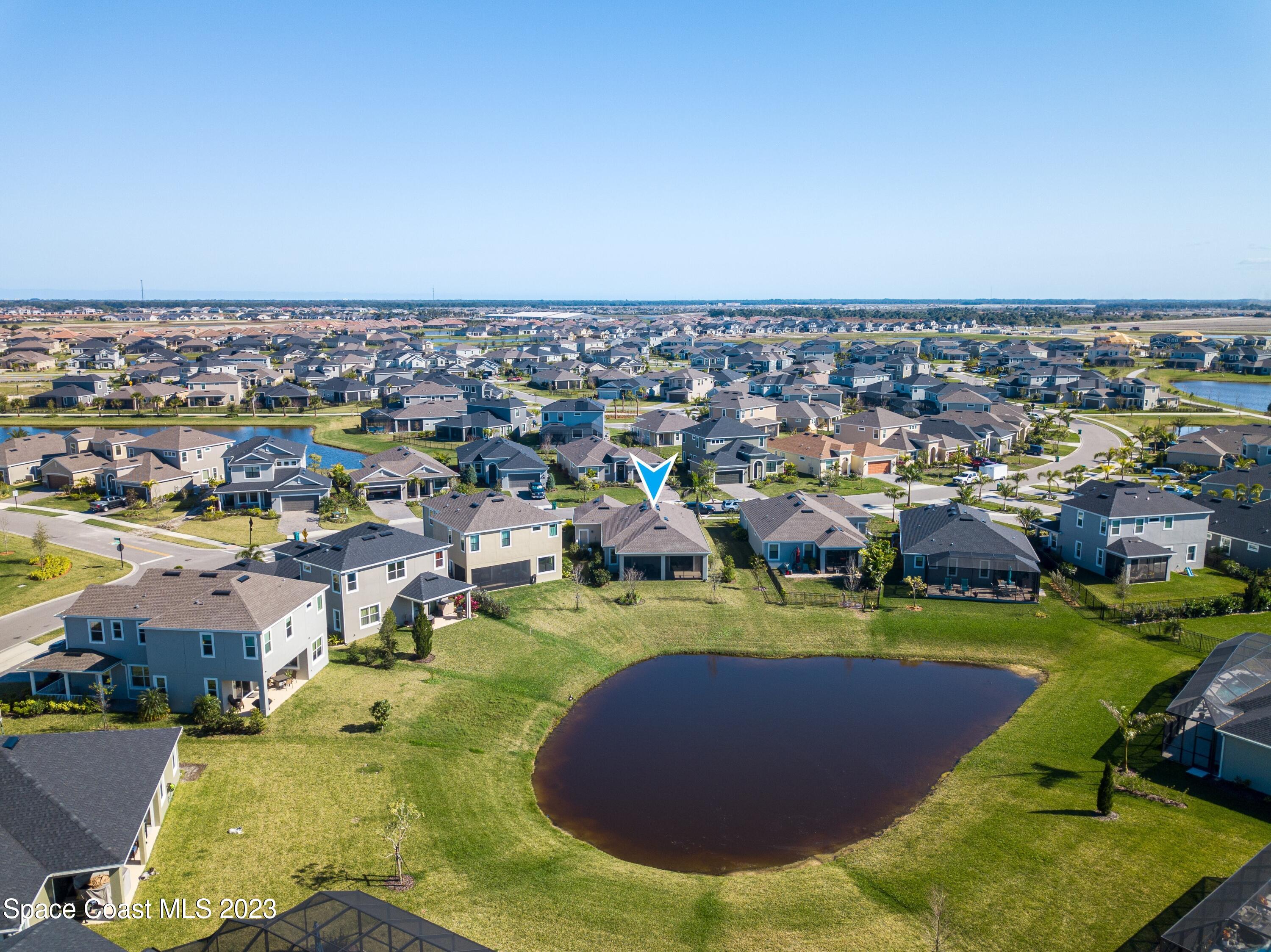 3349 Ribbon Grass Drive Melbourne, FL 32940 - Photo 45 of 45 an aerial view of residential houses with outdoor space