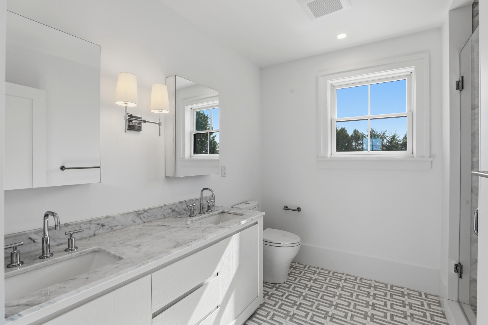 10 Rudder Lane Nantucket, MA 02554 - Photo 27 of 33 a bathroom with a granite countertop sink a toilet and a mirror