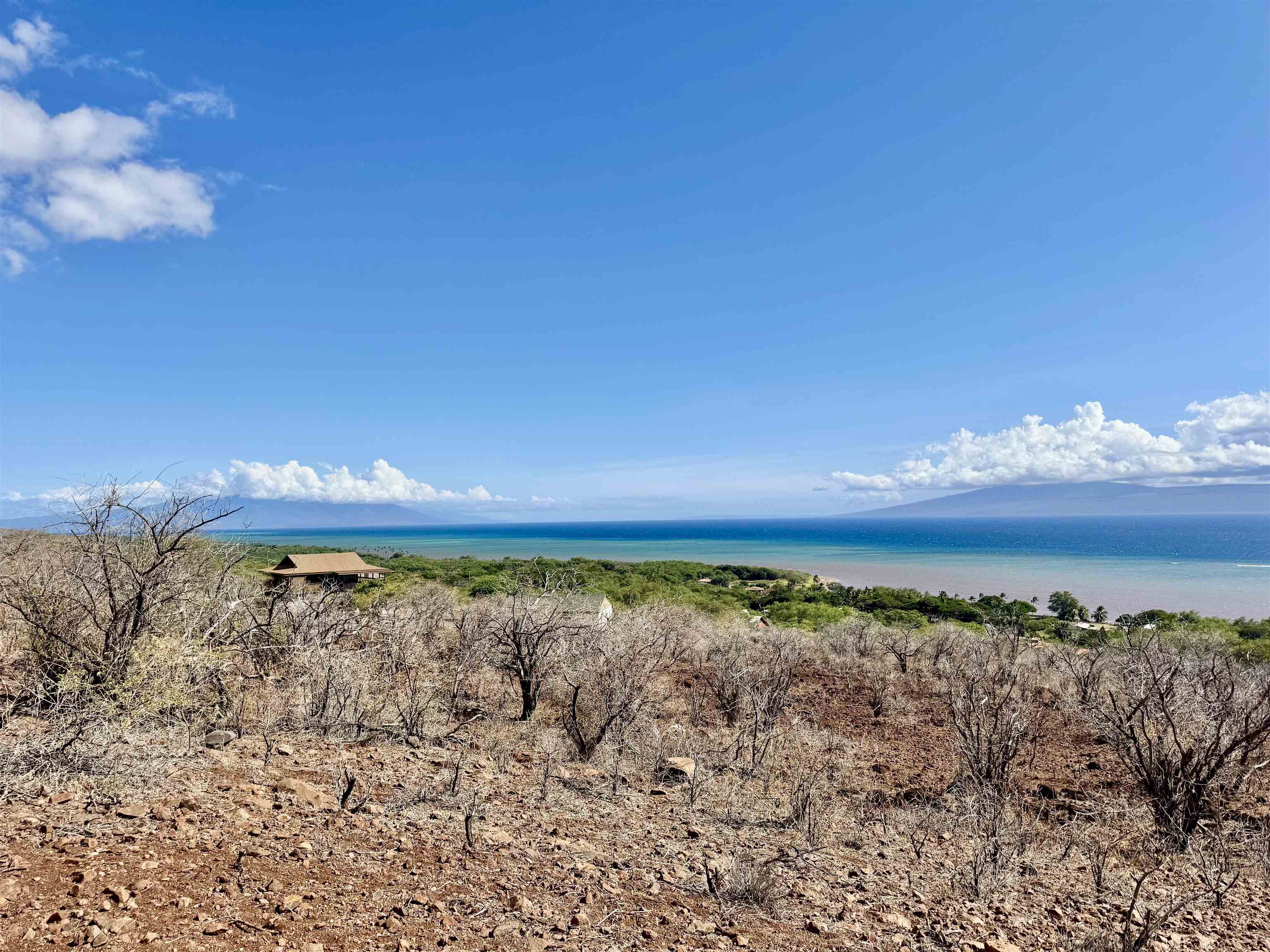 235 Ulua Road, Unit 159 Kaunakakai, HI 96748 - Photo 12 of 14 a view of a room with an ocean beach