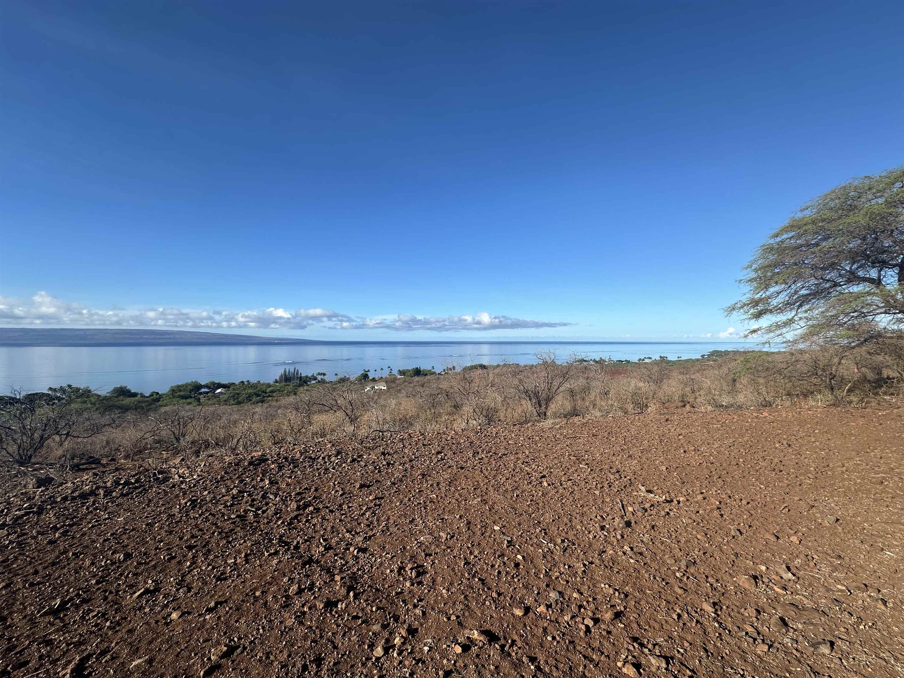 235 Ulua Road, Unit 159 Kaunakakai, HI 96748 - Photo 3 of 14 a view of an ocean beach