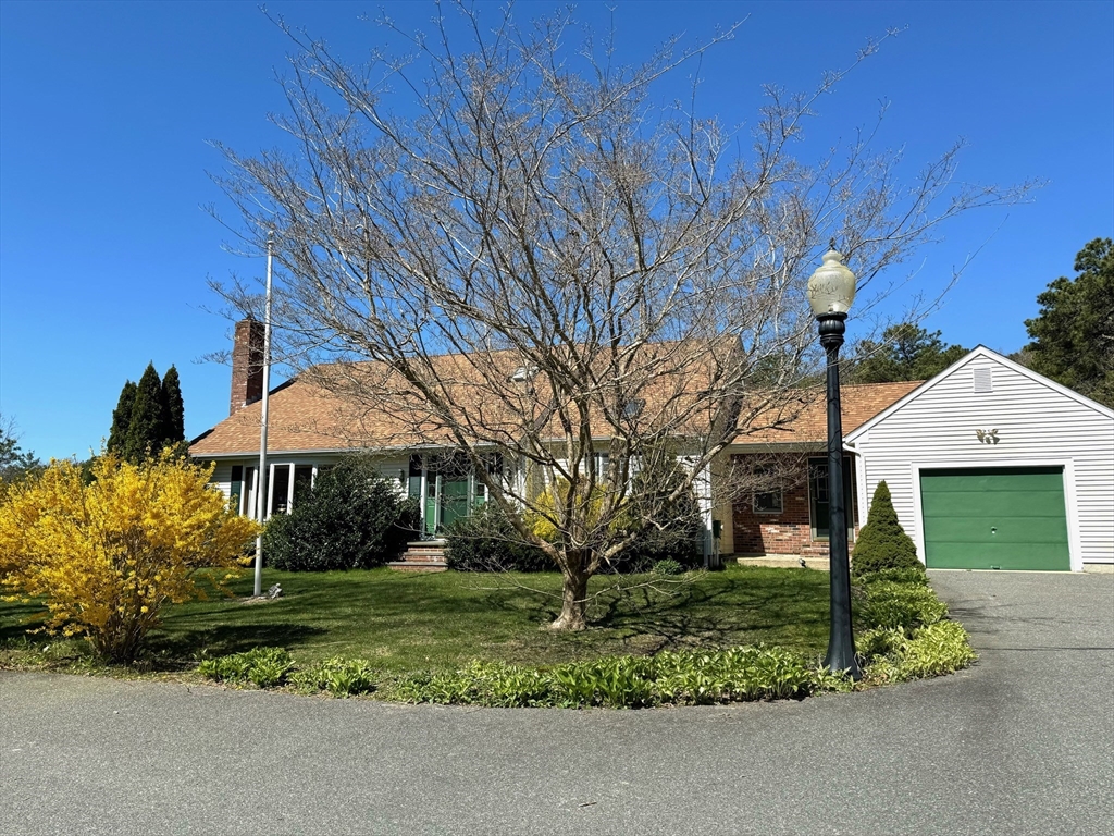 264 John Parker Road Falmouth, MA 02536 - Photo 1 of 41 a front view of a house with garden