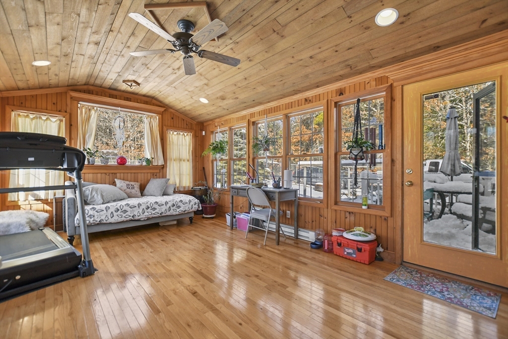 264 John Parker Road Falmouth, MA 02536 - Photo 15 of 41 a bedroom with furniture and large windows