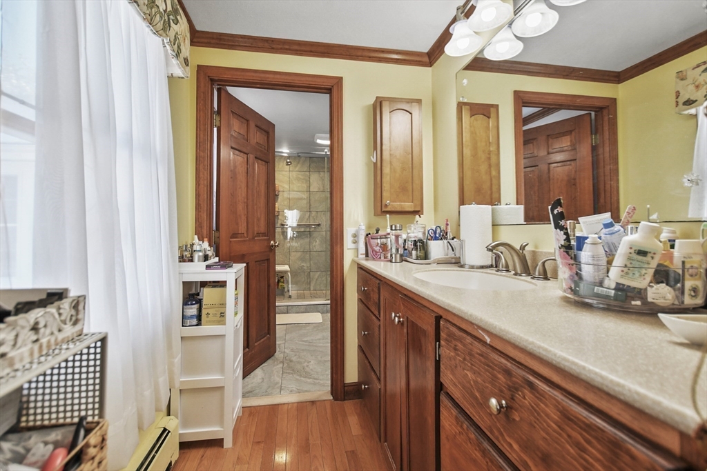 264 John Parker Road Falmouth, MA 02536 - Photo 21 of 41 a bathroom with a sink double vanity and a mirror