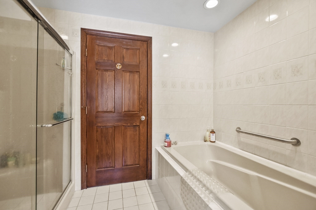 264 John Parker Road Falmouth, MA 02536 - Photo 27 of 41 a bathroom with a tub and shower