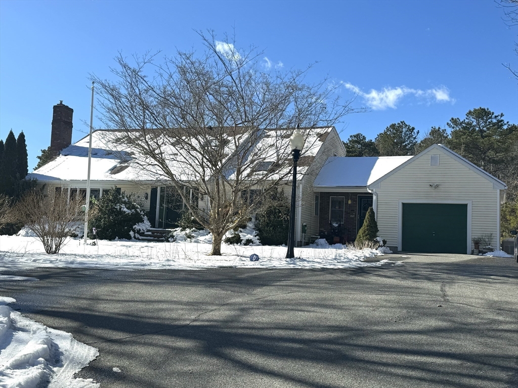 264 John Parker Road Falmouth, MA 02536 - Photo 30 of 41 a view of a house with a yard
