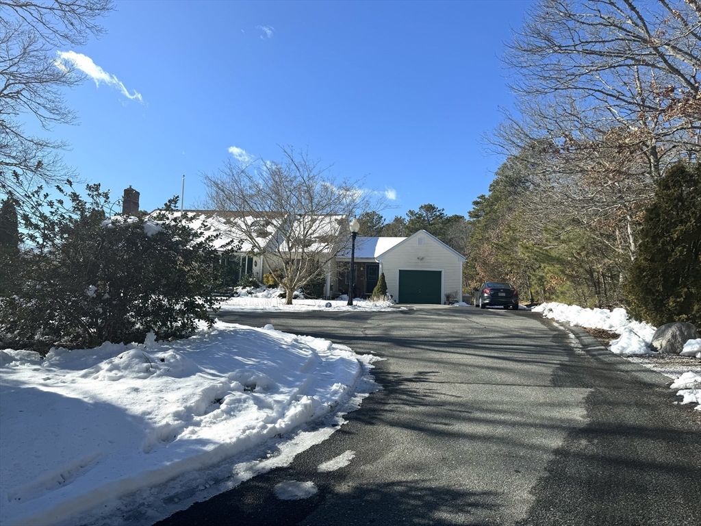 264 John Parker Road Falmouth, MA 02536 - Photo 34 of 41 a view of a house with a yard