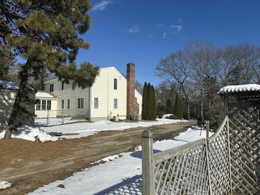 264 John Parker Road Falmouth, MA 02536 - Photo 35 of 41 a view of a house with a yard