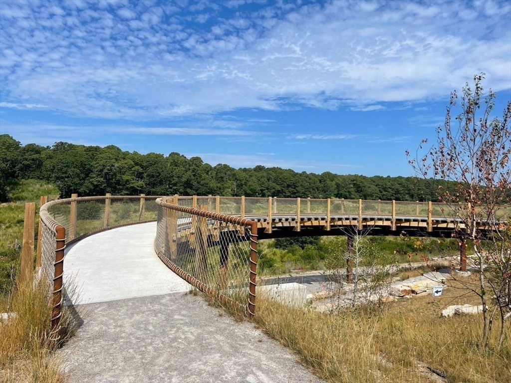 264 John Parker Road Falmouth, MA 02536 - Photo 39 of 41 a view of a lake with a mountain in the background