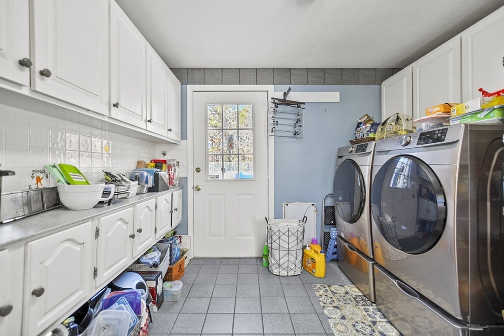 264 John Parker Road Falmouth, MA 02536 - Photo 7 of 41 a storage room with furniture and clutter