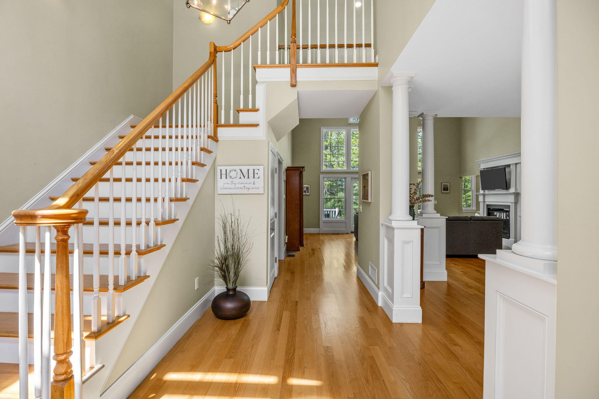17 Payamps Road Mashpee, MA 02649 - Photo 19 of 72 a view of an entryway with wooden floor and a livingroom view