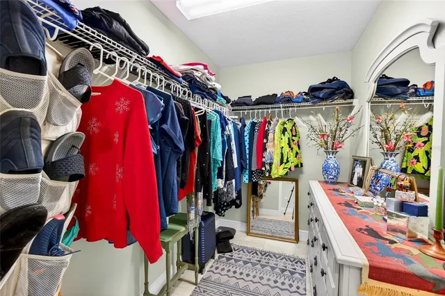 a view of a livingroom with furniture and a flat screen tv