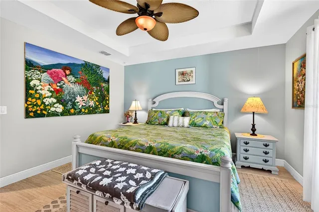 a kitchen with stainless steel appliances kitchen island granite countertop a table and chairs in it