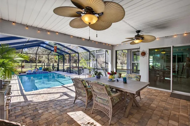 a view of a house with a yard and garage