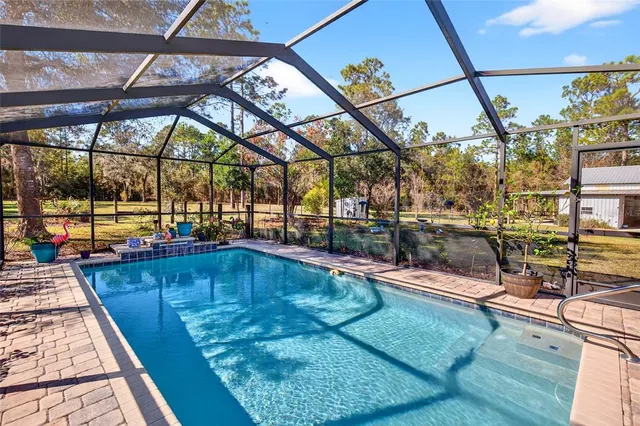 a view of an empty room with wooden walls